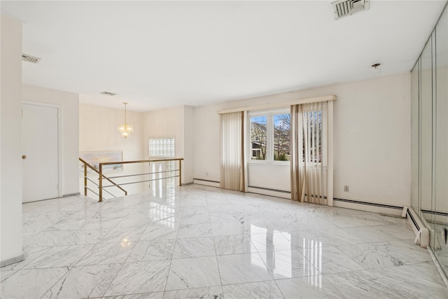 unfurnished room featuring marble finish floor, a baseboard radiator, visible vents, and an inviting chandelier