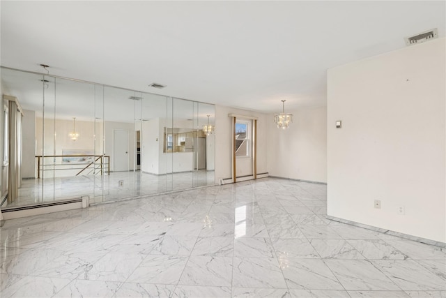 empty room with a baseboard heating unit, marble finish floor, visible vents, and an inviting chandelier