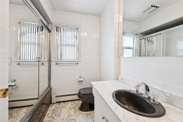 bathroom featuring marble finish floor, a shower with door, tile walls, a baseboard radiator, and visible vents