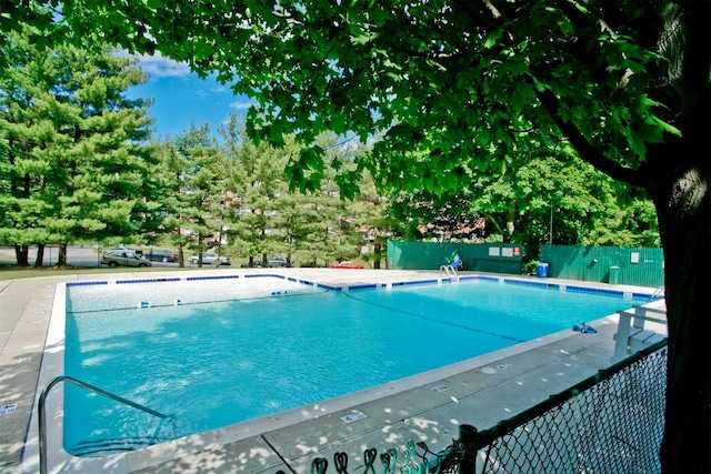 community pool with fence