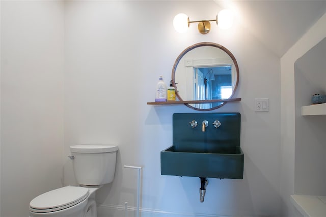 half bathroom with toilet