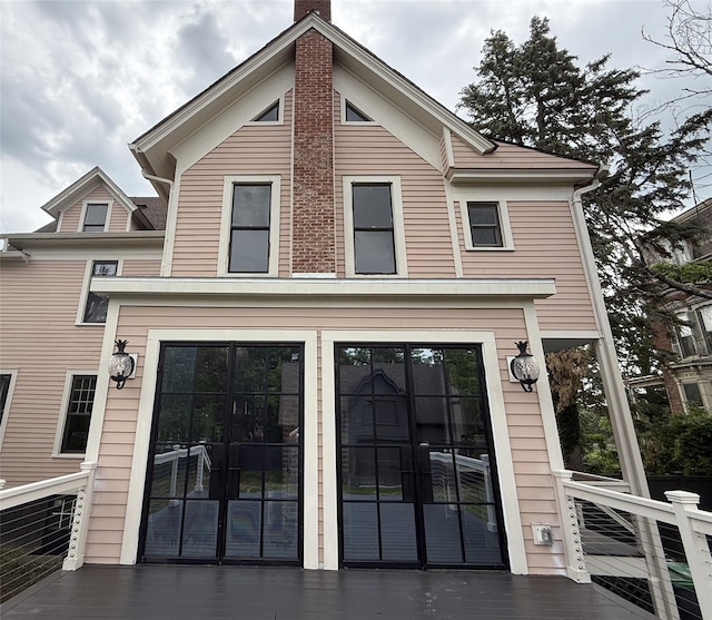 25 Prospect Ave, Catskill, NY 12414 - rear view of house with a chimney
