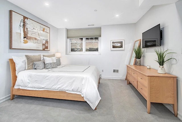 bedroom featuring light carpet, recessed lighting, visible vents, and baseboards