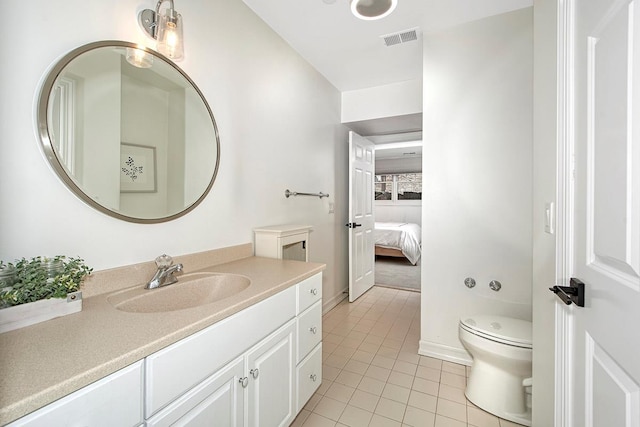 bathroom with visible vents, baseboards, toilet, tile patterned flooring, and vanity