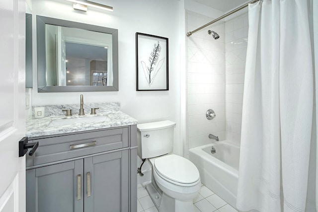 bathroom with tile patterned floors, vanity, toilet, and shower / bath combo with shower curtain