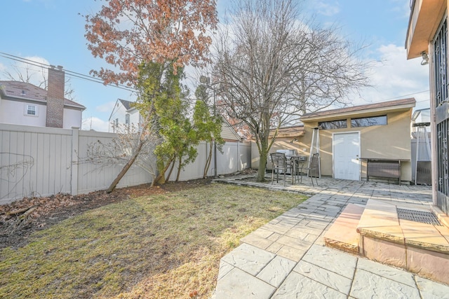 view of yard featuring a patio and a fenced backyard