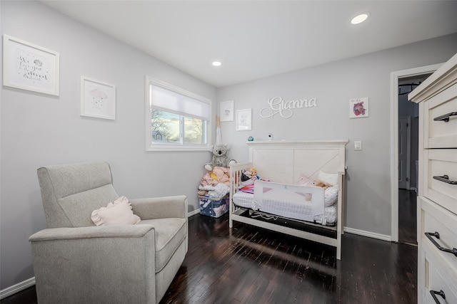 bedroom featuring dark wood-style flooring, recessed lighting, and baseboards