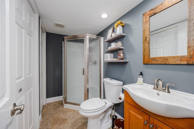 full bath featuring toilet, a shower stall, visible vents, and vanity