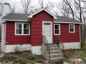 view of outbuilding featuring entry steps