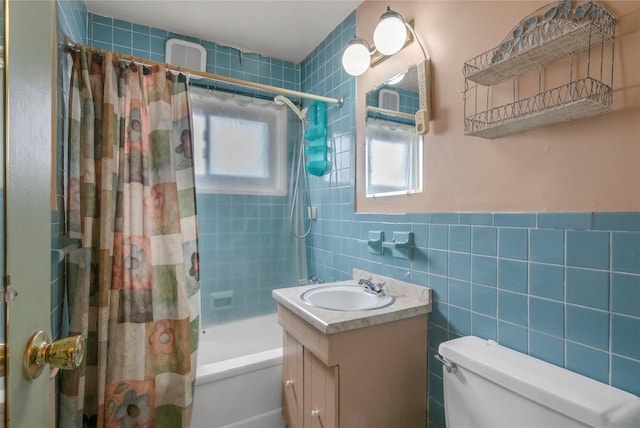 bathroom featuring toilet, tile walls, vanity, and shower / bathtub combination with curtain