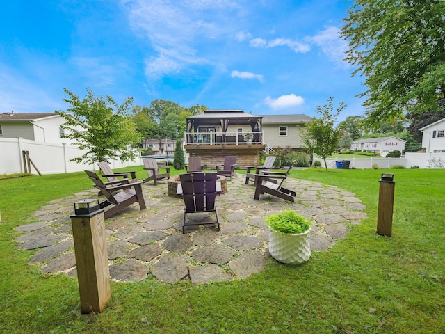 view of yard with a patio, a fire pit, a gazebo, and fence