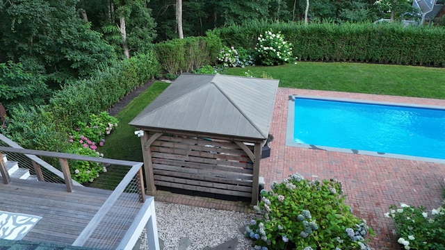 12 Bob White Dr, Water Mill, NY 11976 - view of swimming pool featuring a fenced in pool, a lawn, a deck, and a gazebo
