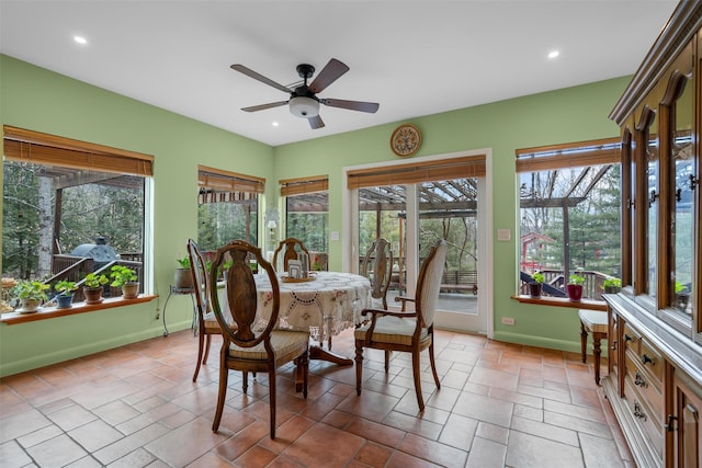 dining area featuring recessed lighting, ceiling fan, and baseboards