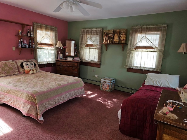 bedroom with carpet floors, multiple windows, and baseboard heating