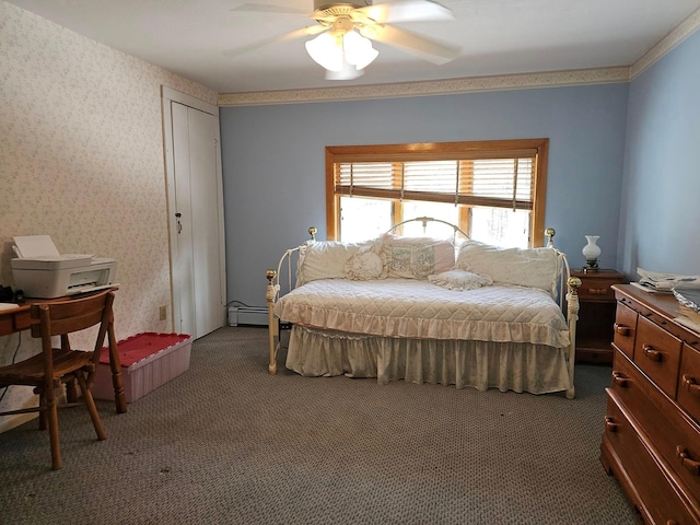 bedroom with wallpapered walls, a ceiling fan, a baseboard radiator, dark colored carpet, and a closet