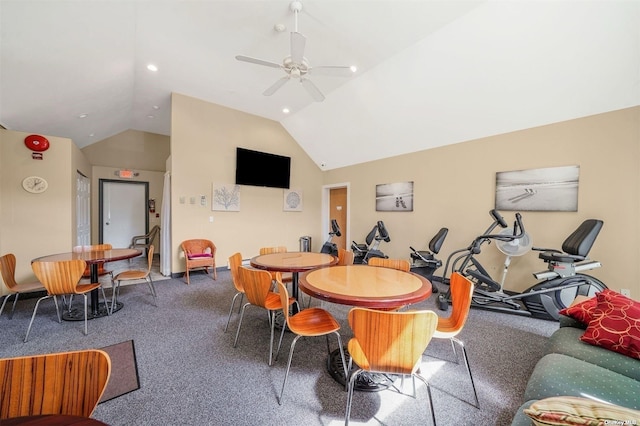 recreation room featuring a ceiling fan, carpet, and vaulted ceiling