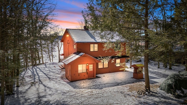 view of property exterior at dusk