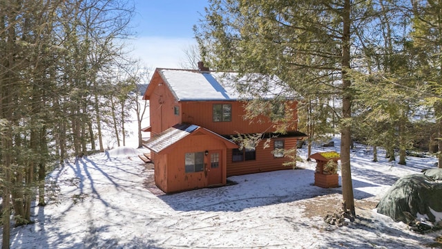 view of snow covered property