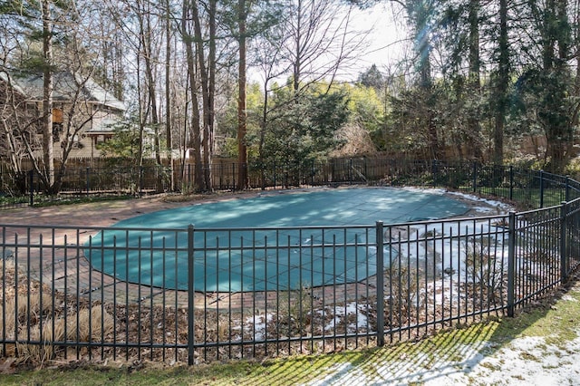 view of pool featuring a fenced in pool, a patio area, and fence