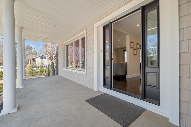 entrance to property with a porch