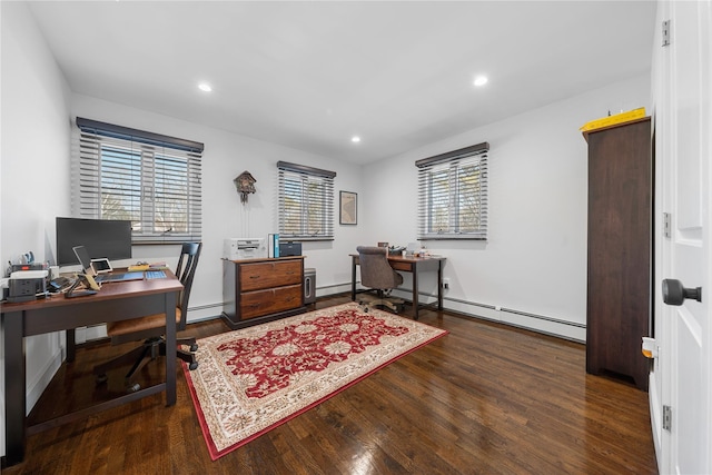 office area with recessed lighting, a baseboard radiator, and wood finished floors