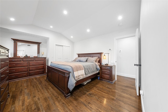 bedroom with vaulted ceiling, dark wood-type flooring, a closet, and recessed lighting