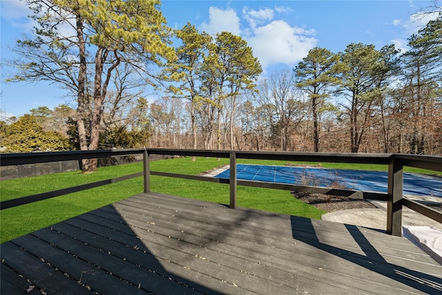 wooden deck with a yard