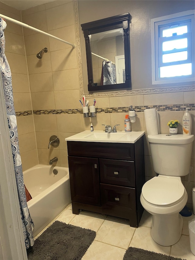 113-21 203rd St, Saint Albans, NY 11412 - full bath with tile patterned floors, tile walls, shower / bath combo, toilet, and vanity