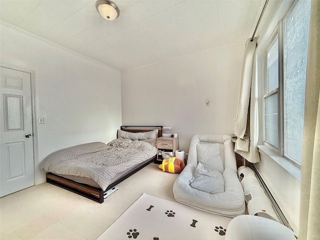 bedroom featuring crown molding