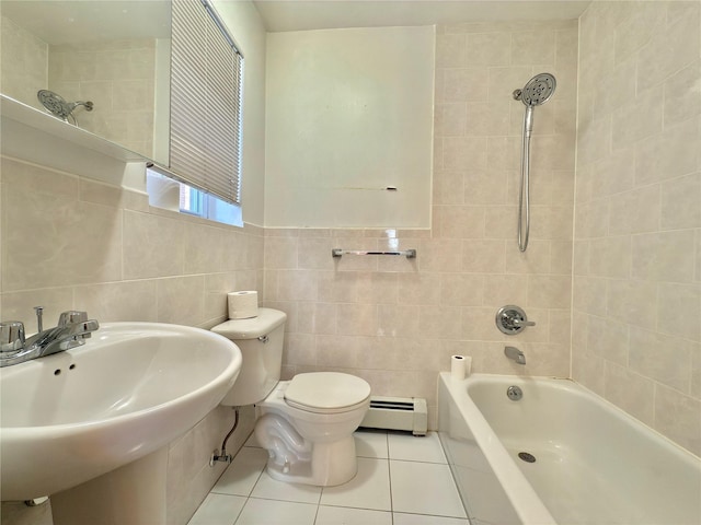 bathroom with tile patterned flooring, a baseboard heating unit, shower / bath combination, a sink, and tile walls