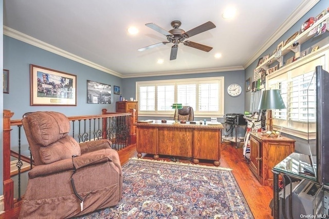 office space featuring ornamental molding, wood finished floors, and a ceiling fan