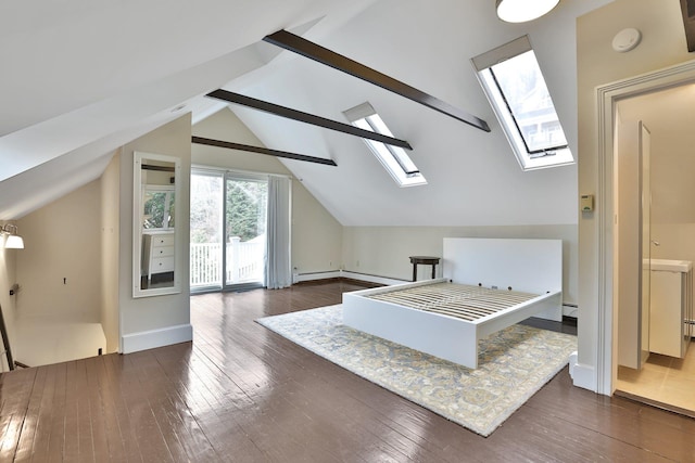 bonus room featuring dark wood-style floors, vaulted ceiling with skylight, and baseboards