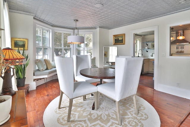 20 Stevenson St, Piermont, NY 10968 - dining area with hardwood / wood-style floors, an ornate ceiling, and ornamental molding