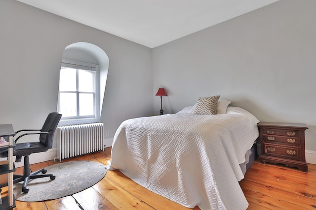 20 Stevenson St, Piermont, NY 10968 - bedroom featuring radiator heating unit, hardwood / wood-style floors, and baseboards