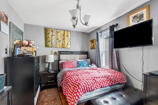 bedroom featuring dark wood-style flooring
