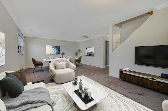 carpeted living area with ornamental molding, visible vents, and baseboards