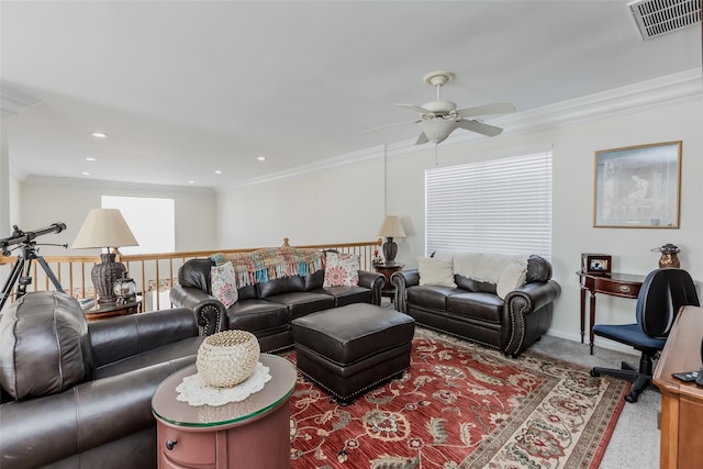 living room with ornamental molding, recessed lighting, and visible vents