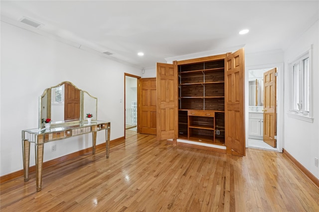 bedroom with visible vents, baseboards, crown molding, light wood-type flooring, and recessed lighting