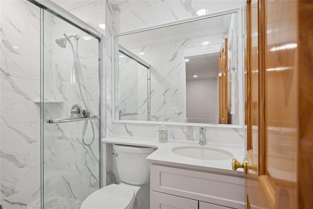 bathroom with toilet, vanity, and a marble finish shower