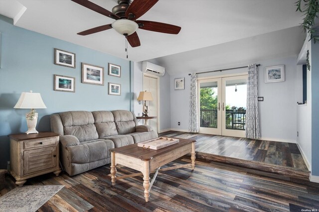 living room featuring a wall unit AC, baseboards, wood finished floors, and french doors