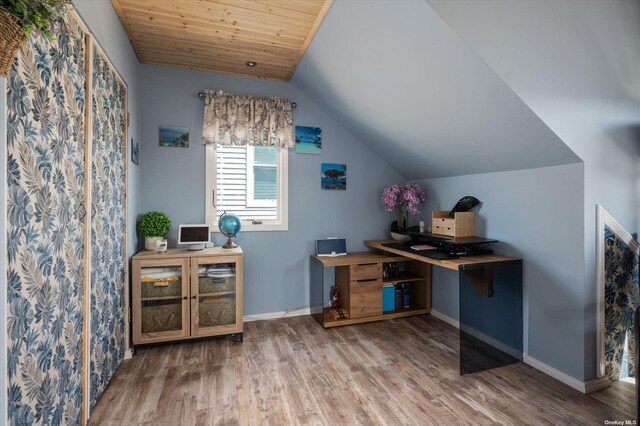 office featuring wood ceiling, baseboards, vaulted ceiling, and wood finished floors