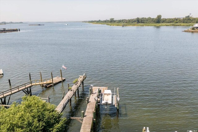 dock area featuring a water view and boat lift