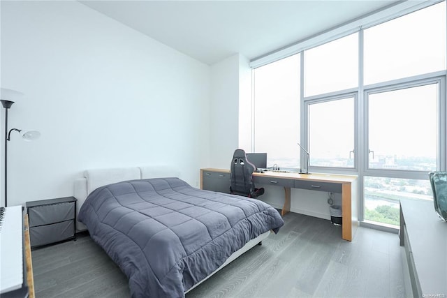 bedroom featuring wood finished floors