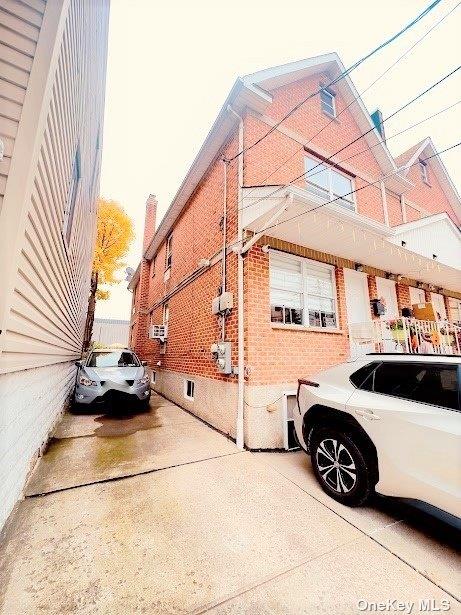 view of home's exterior featuring brick siding