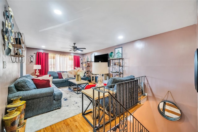 living room with ceiling fan, wood finished floors, and recessed lighting