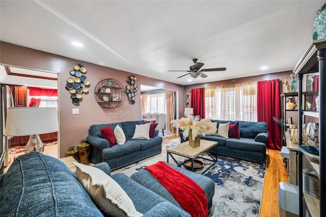 living room featuring ceiling fan, wood finished floors, and recessed lighting