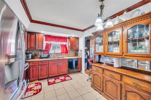 kitchen featuring crown molding, tasteful backsplash, light countertops, appliances with stainless steel finishes, and a sink