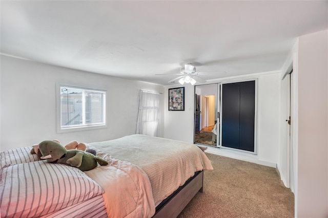 bedroom featuring light carpet and ceiling fan