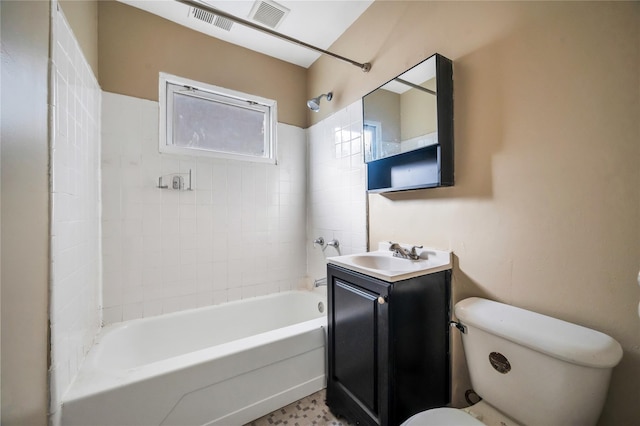 full bath with toilet, vanity, visible vents, and shower / bathtub combination