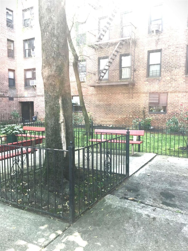 view of gate with fence